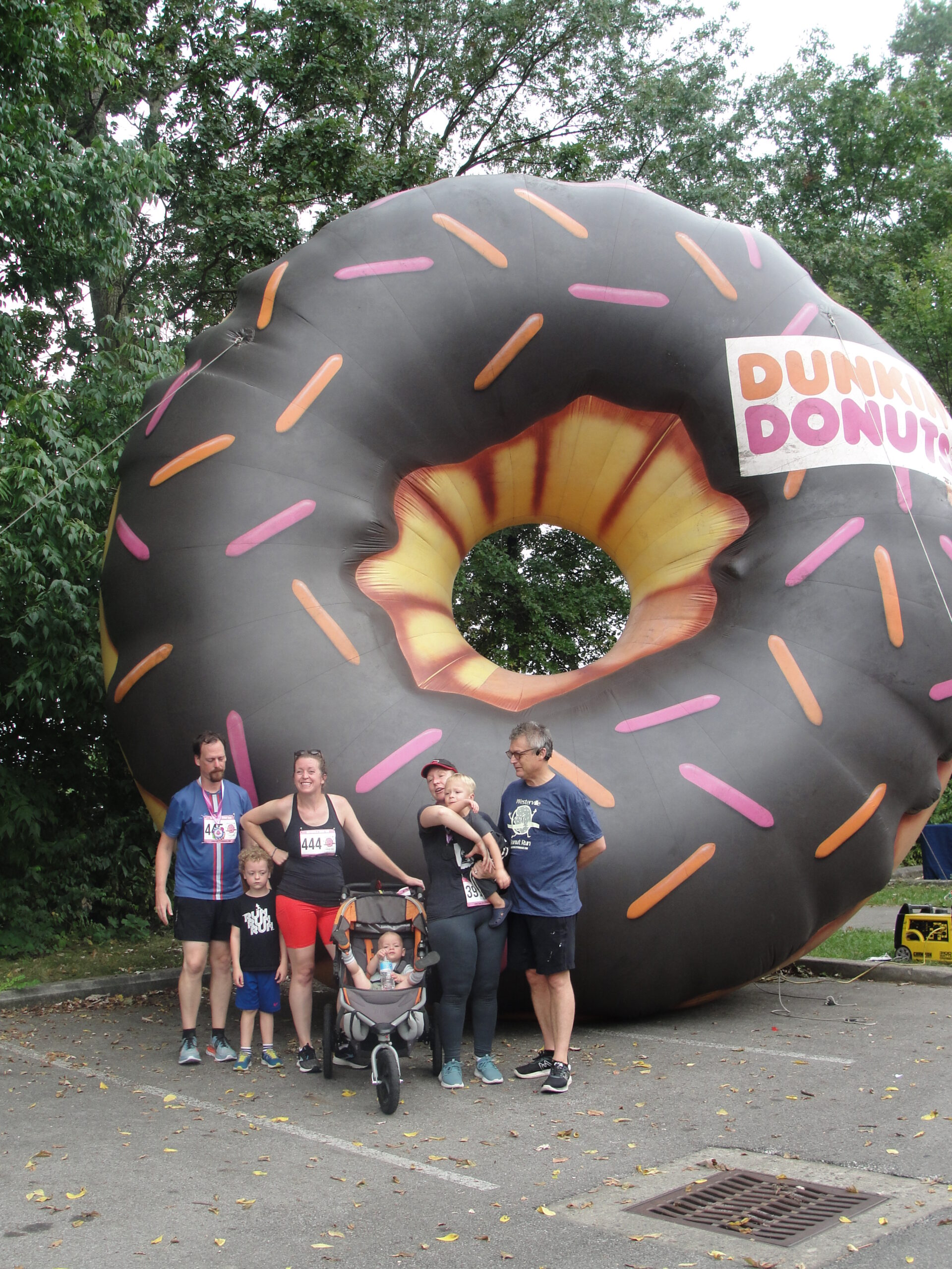 Family Photo - Doughnuts For All Ages - Giant Inflatable Donut - Westerville Donut Run - Columbus Donut Run - USA Race Timing & Event Management - Special Event Rentals - https://www.specialevent-rentals.com/ - https://runsignup.com/Race/OH/Columbus/ColumbusDonutRun - https://www.facebook.com/ColumbusDonutRun/